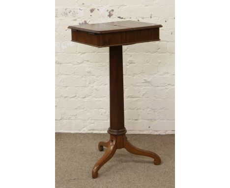 A Victorian mahogany gentleman's shaving stand. Raised on a hexagonal pedestal over a tripod base. 