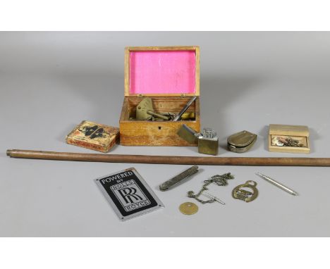 A vintage yard stick, along with a box of collectables including, a brass equestrian themed snuff box, a Zippo lighter, pen k