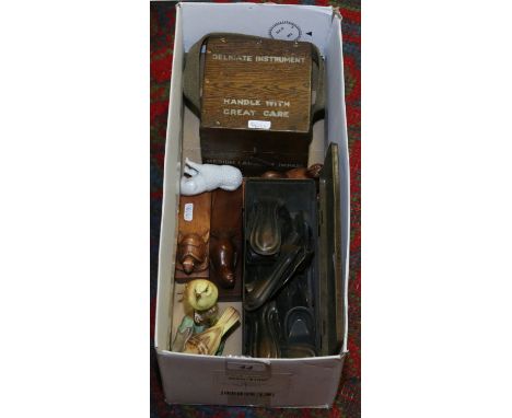 A collection of various treen and other items to include three door stops depicting chicken, seal and tortoise, war time inst