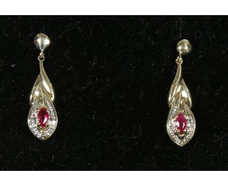 A pair of ladies 9 carat gold, ruby and diamond earrings.