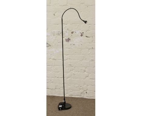 An LED black painted reading lamp on stand.