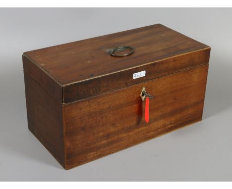 A C19th walnut tea caddy loop handle, twin compartments, mother of pearl escutcheon.