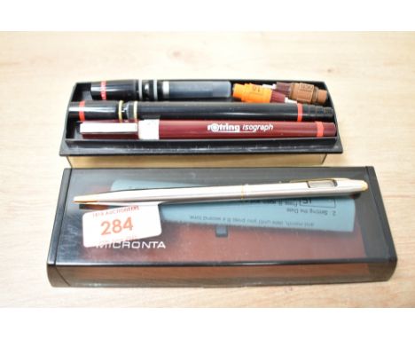 A Rotoring Isograph drawing pen and a boxed Micronta ballpoint pen
