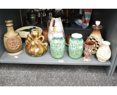 A pair of Armadale pottery vases decorated with a green drip glaze, h17cm, sold together with a Sylvac ware vase and a terrac