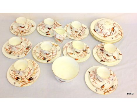 A Victorian porcelain hand painted with birds, part dinner / tea service (32 pieces)