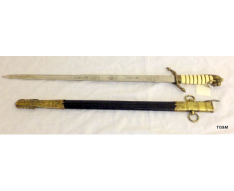 A 20th century British Royal Navy midshipman's dirk in scabbard 