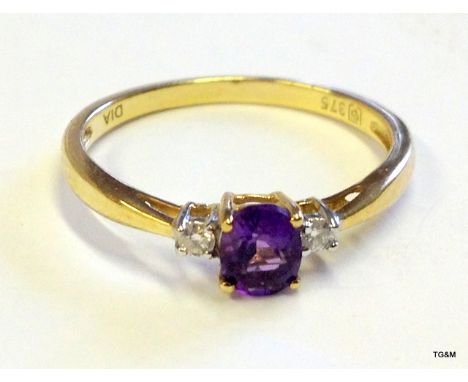 A 9ct gold Amethyst and Diamond ring size N