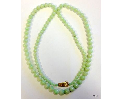 A set of graduated Jade beads total length 80cm