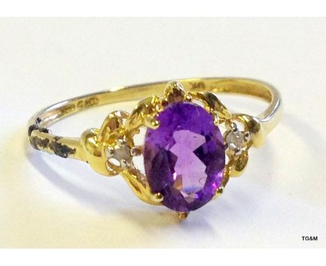 A 9ct gold Amethyst and diamond ring size N