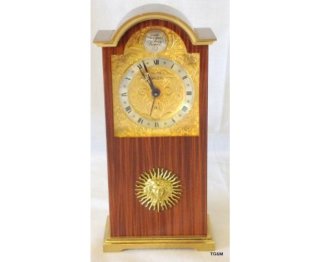 A Swiza Tempus Fugit solid brass mantle clock