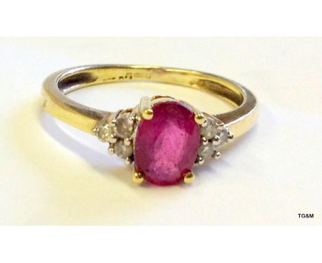 A 9ct gold Ruby and Diamond ring size K