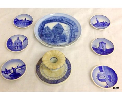 A Royal Copenhagen Porcelain candle stick and plates 8 pieces