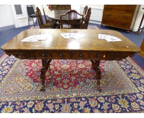 AN EARLY 19TH CENTURY MAHOGANY AND ROSEWOOD CROSSBANDED SOFA TABLE, each side with drawer and dummy drawer, lyre style end su