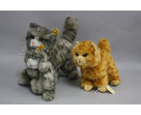 A STEIFF WHISKERS CAT AND KITTEN, No.075360, with button ears in both and orange labels, length approximately 26cm (Cat), tog