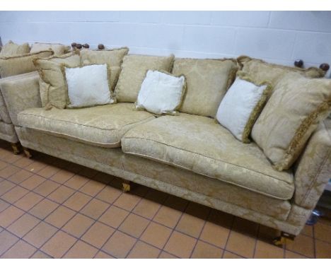 A LARGE TWO SEATER KNOLL SOFA, with gold embossed floral upholstery, approximate size length 230cm x depth 110cm x height 88c