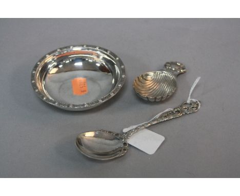 A SILVER BOWL, with dragon motif border, Birmingham 1970, approximately 1.9ozt, a Continental 830 spoon with pierced and twis