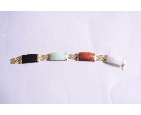 A 14CT JADE FOUR PLAQUE BRACELET, approximate length 20cm
