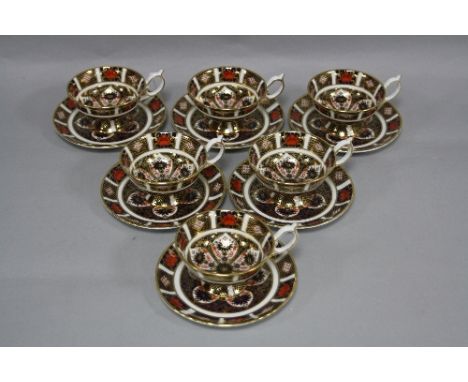 SIX ROYAL CROWN DERBY OLD IMARI TEACUPS AND SAUCERS, (Elizabeth shape), '1128' pattern (12)