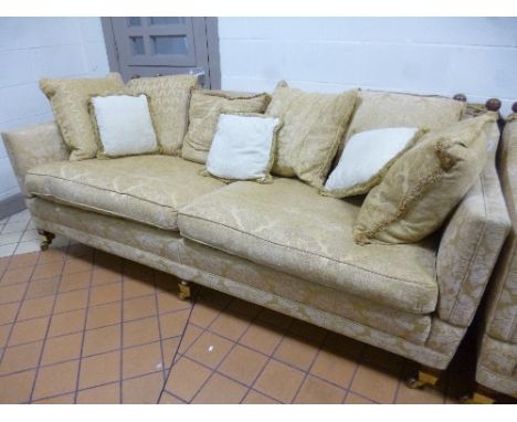 A LARGE TWO SEATER KNOLL SOFA, with gold embossed floral upholstery, approximate size length 230cm x depth 110cm x height 88c