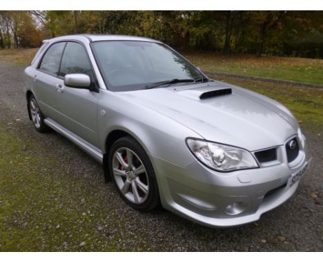A SUBARU IMPREZA WRX SL SPORT WAGON AWD 5 DOOR HATCHBACK, Reg No SCO 88E, 2,457 cc turbo charged four cylinder petrol engine,