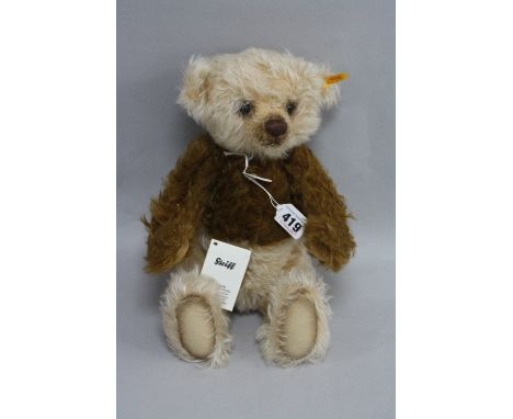 A STEIFF CLASSIC TEDDY BEAR, 'Latte Macciato', jointed limbs, two tone cream and brown mohair, button in ear and orange label