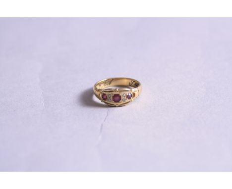 AN 18CT RUBY AND DIAMOND RING, ring size N, approximate weight 5.6 grams (box)
