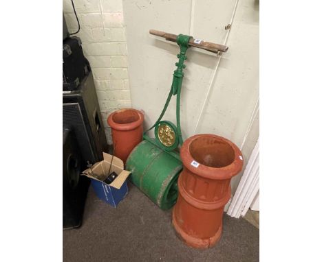 Vintage garden roller and two terracotta chimney pots (3).