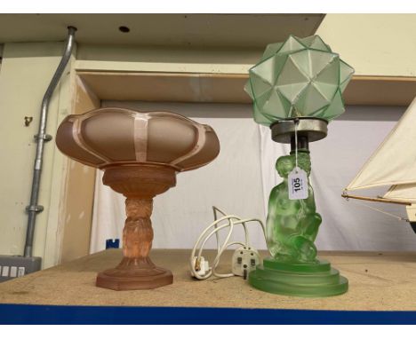 Art Deco green table lamp and a pink stemmed dish.