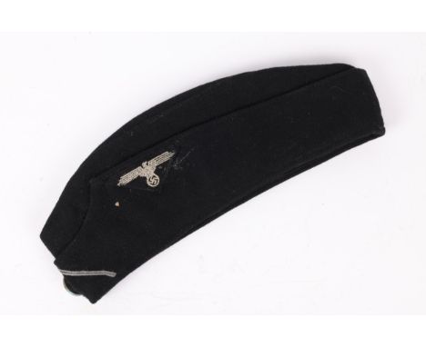 A Third Reich SS Panzer OR's field cap, black with metal button and embroidered eagle. GC £300-350