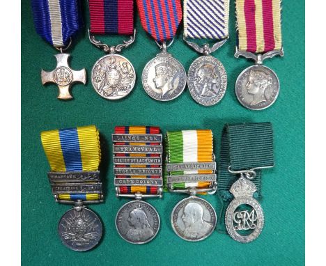 A small collection of 22 miniature medals including: DSC EIIR issue, DCM Vic issue, George Medal Geo VI first type, DFM EIIR,