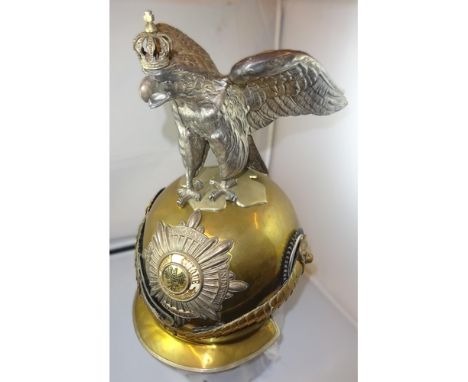 An Imperial German Officer's Garde du Corps dress helmet, WM bound brass skull surmounted by swooping crowned eagle, fine sil