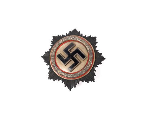 A Third Reich German cross, WM and bronze finish, marked "C Brehmer Markheukirchen" on reverse, GC (pin missing) £70-100