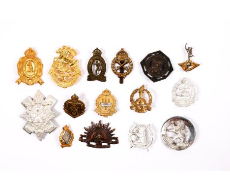 26 pre 1953 Australian cap badges, many pre WWII, including 10th, 23rd, 40th, 56th and 61st Bns, Army Service Corps; Medical 