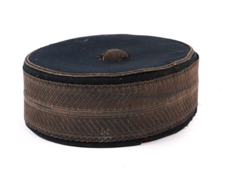 A Victorian cavalry officer's blue pill box, with gilt bullion braid and top button. QGC (chinstrap and sweat band missing) £