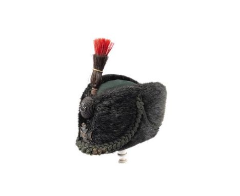 A good Buckinghamshire Battalion post 1902 OR's sealskin rifle cap, blackened badge and strung bugle boss badge, red and blac