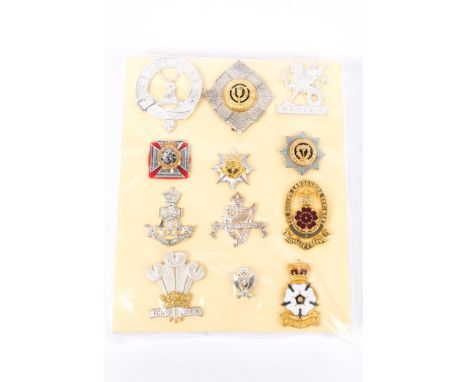 12 Officers cap badges in silver, gilt and some enamel, including Lovat Scouts, KC Royal Ulster Rifles, Queen's Lancashire Re
