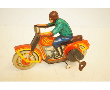 Vintage tin plate motorcycle &amp; rider - working order with key 