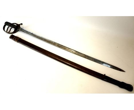 A Victorian Officer's dress sword, with leather scabbard, shagreen and wire bound grip, etched blade 'Hawkes &amp; Co, Picadi