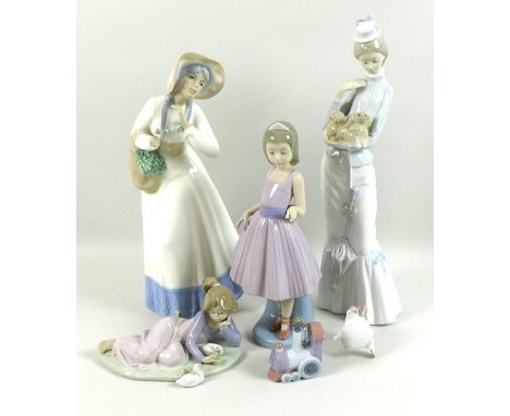 A group of modern Lladro figurines, comprising lady with puppy, 37cm, ballerina girl, and girl lying down with ducks, togethe