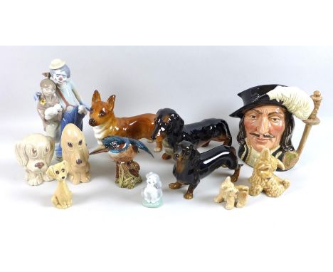 A collection of 20th century ceramic figures including a Lladro model of a clown and girl with two puppies, numbered 7686, 22