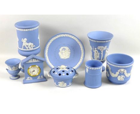 A group of modern Wedgwood blue jasperware, comprising commemorative 'Wedding Day' plate, three pedestal urns, potpourri and 