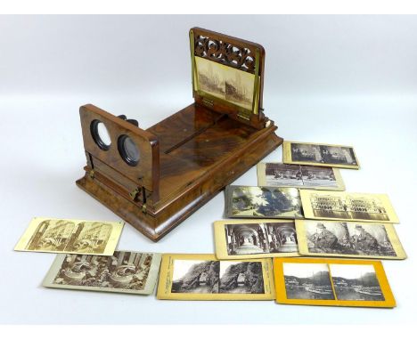 A Victorian Rowsells Patent stereoscopic viewer, 40 by 23.5 by 24cm high when open, with eleven photo card slides, Universal 