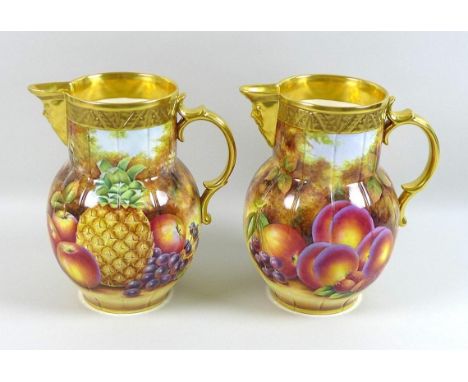 A pair of modern Royal Worcester ?Pineapple Mask? jugs, decorated with peaches and pears, limited edition 13/50, dated 2001, 