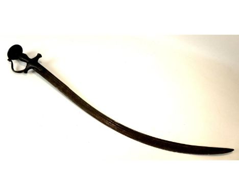 A 19th century Indian tulwar sabre, with single edged fullered blade, with cast iron handle, missing scabbard, blade 73cm , 8