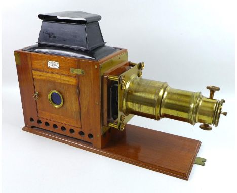 A Victorian Broadhurst Clarkson &amp; Co magic lantern, mahogany and brass, retailed by Newton &amp; Co, Opticians to the Que
