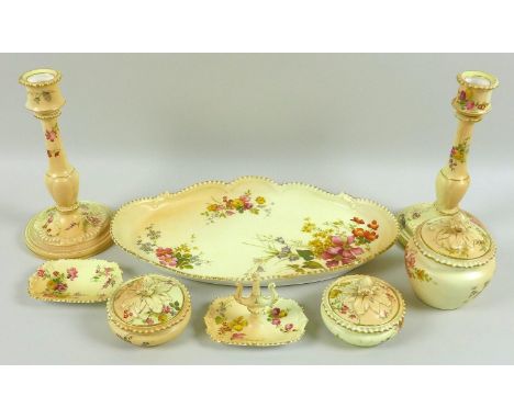 An Edwardian Royal Worcester eight piece toilet set, decorated with sprays of flowers against an ivory blush ground, comprisi