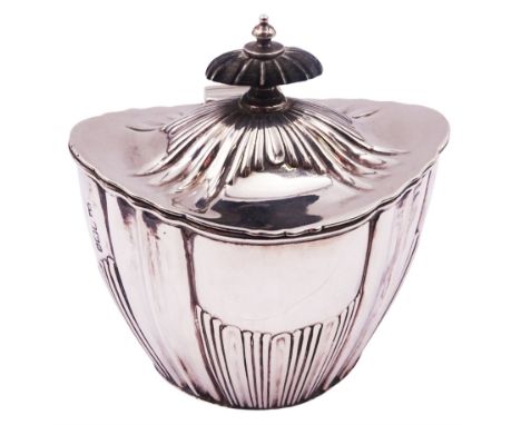Edwardian silver tea caddy, of tapering oval part fluted form, the hinged cover with ebonised finial, hallmarked Horace Woodw