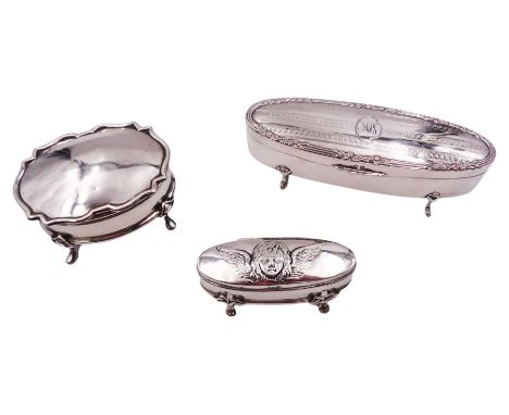 Early 20th century silver dressing table box, of oval form, the hinged cover with engraved monogram to centre, engine turned 