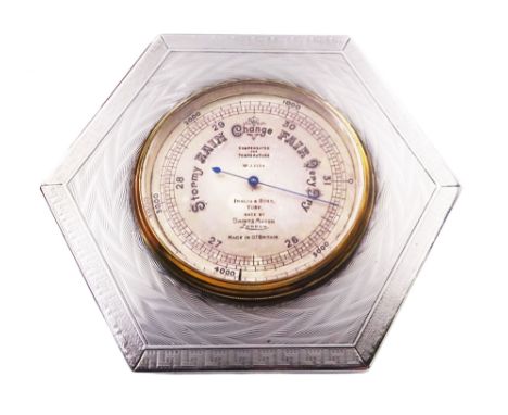 1930's silver cased Britannia Standard desk or travel barometer, of hexagonal form with engine turned decoration and key fret