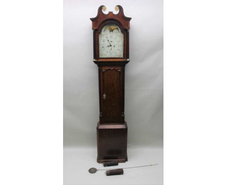 AN EARLY 19TH CENTURY OAK LONGCASE CLOCK, the hood having twin swan pediment, 8-day movement, tapering pilaster sides, the pa